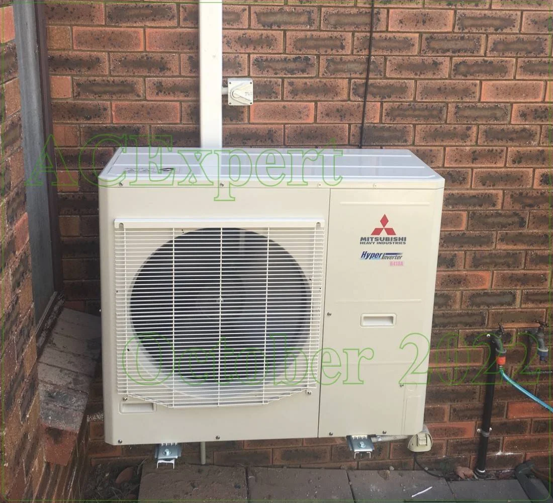 Balcony Cabling Installation by Expert Technician securing balcony cabling for a split system air conditioner on a Melbourne apartment balcony