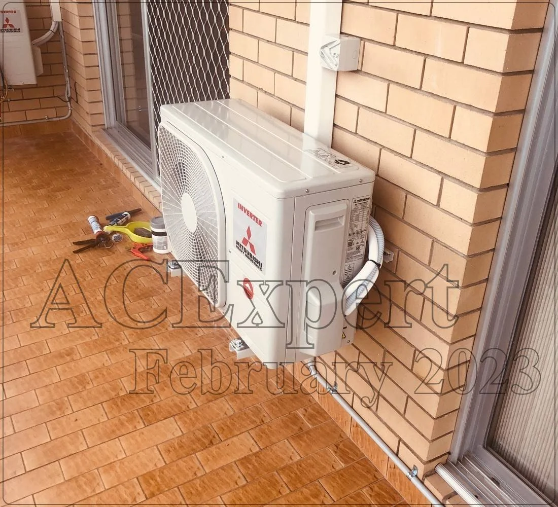 Technician installing a compliant split system air conditioner in a Melbourne childcare centre, ensuring safety and comfort