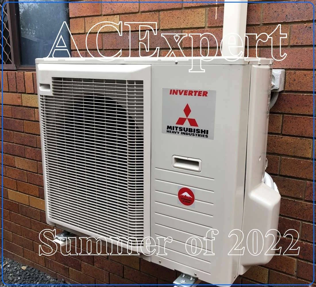 Technician installing a split system air conditioner with details on small business rebates in Melbourne
