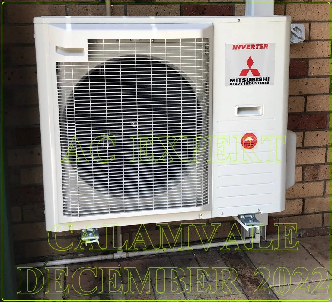 Technicians installing commercial air conditioning units in a Melbourne business, ensuring optimal performance — call