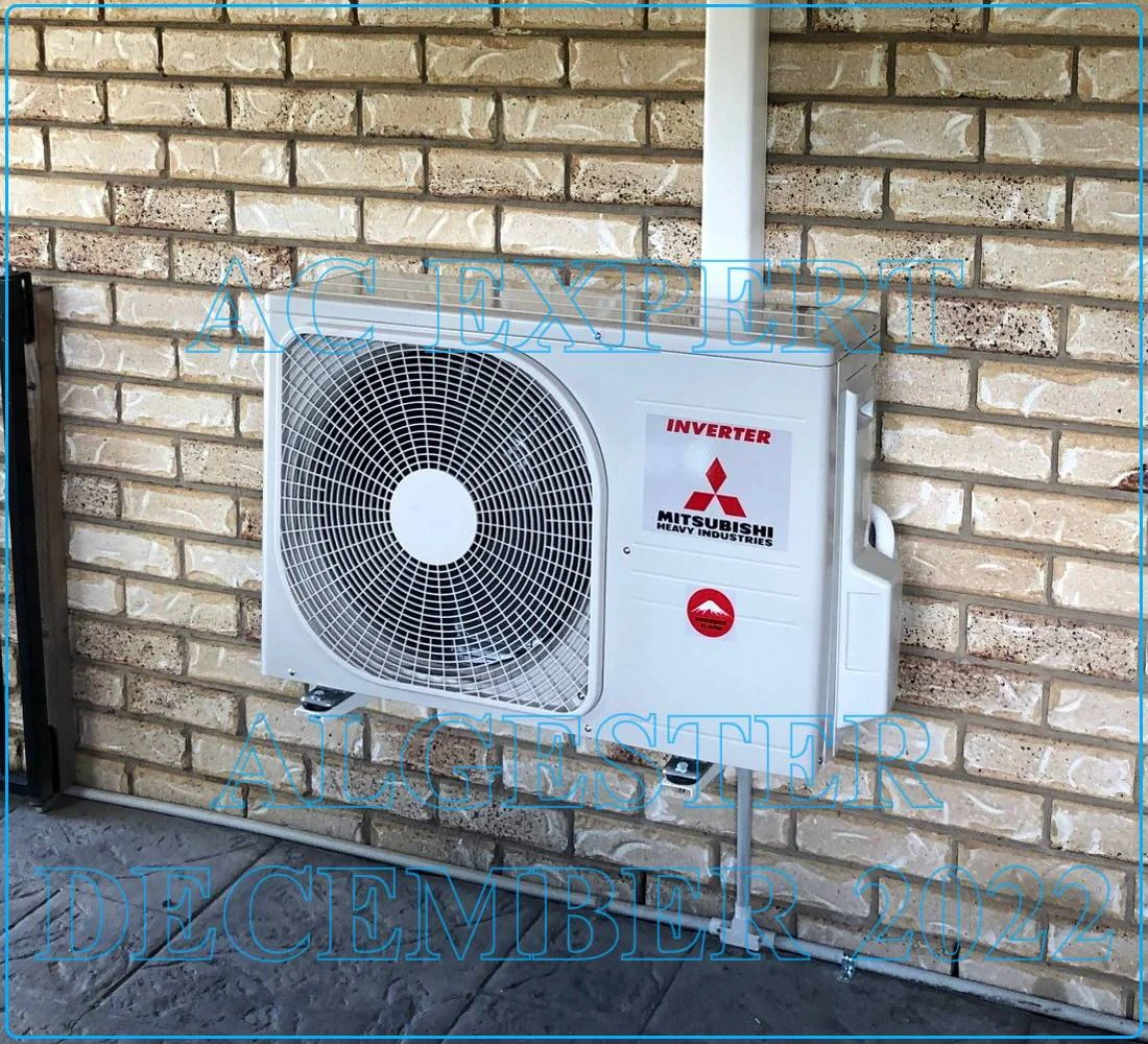 Technician comparing split system ducting options during a Melbourne installation, showing ducted versus ductless units side